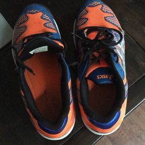 orange and blue asics tennis shoes